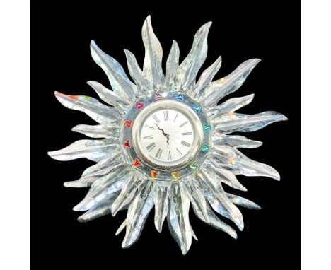 Part of the Exquisite Accents series. Lead crystal clock intricately detailed featuring a rainbow of colorful crystals framin