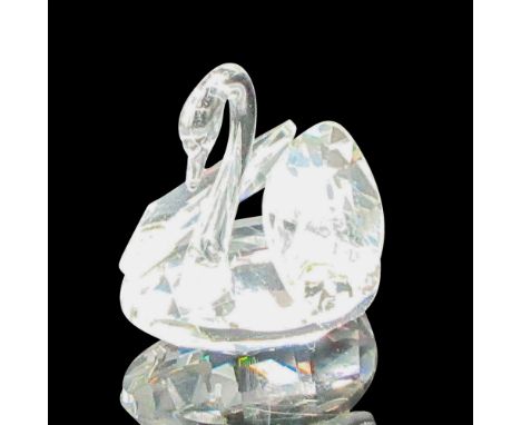 Delicate design of facets on body with smooth head and neck. Swarovski backstamp. 7658027000. This item has its original box: