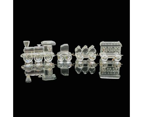 This fantastic set includes the locomotive, the coal car, barrel car, and passenger car in beautiful, faceted crystal. Swarov