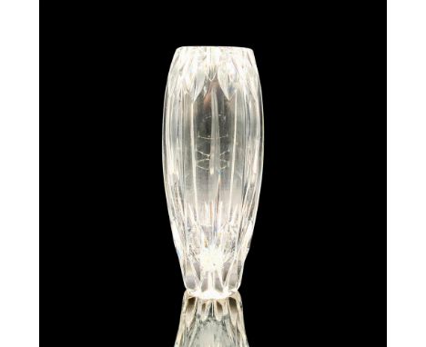 A clear crystal vase with diamond relief patterns and thin grooves throughout the design. This item has its original box. Dim