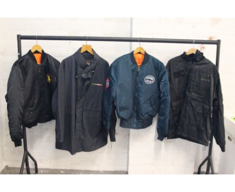 ERIC CLAPTON COATS - 4 Eric Clapton Tour coats to include a black EC 1987 puffer jacket with orange interior, a black EC Worl