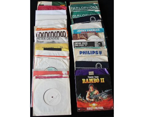 TV/FILM THEME SINGLES - A strong collection of 35 x 7" singles featuring many demos. Artists/titles include Tommy Cooper, Fra