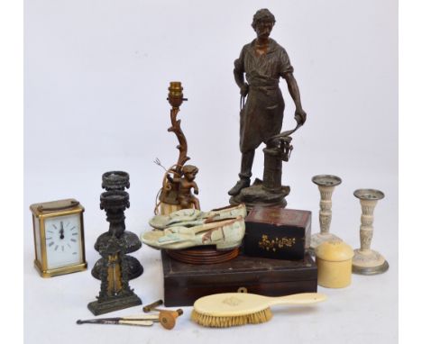 A quantity of collectors' items including a spelter figure, figural lamp, pair of carved candlesticks, rosewood box containin