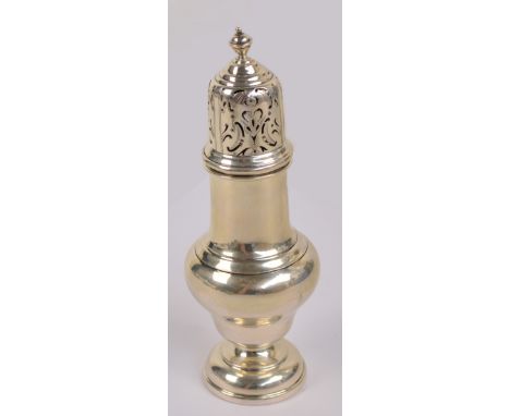 A George V hallmarked silver sugar caster of baluster form with pierced domed cover and turned finial, raised on domed foot, 
