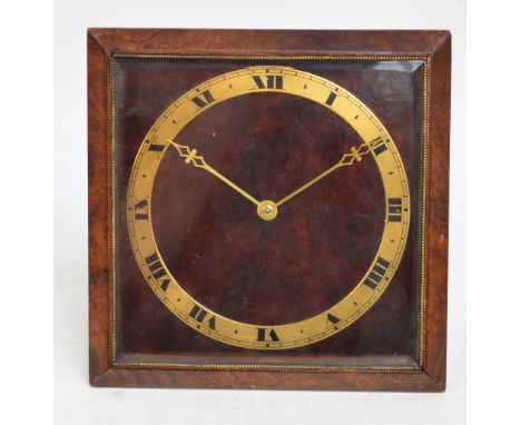 An early to mid 20th century walnut cased and brass set easel back mantel timepiece with Roman numerals to the chapter ring a