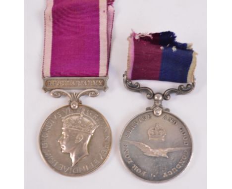 An Army Long Service and Good Conduct Medal with Regular Army bar awarded to 1059153 W.O.Cl.2. S.Ridout. R.A. and an R.A.F. L