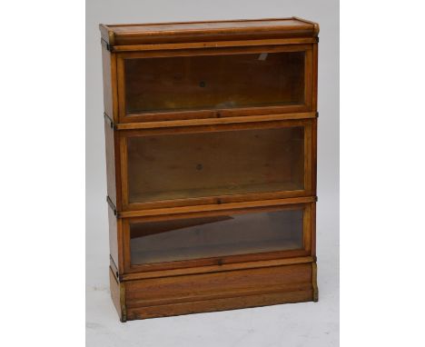 A mid 20th century oak three section Globe Wernicke stacking bookcase, width 86cm, height 120cm.