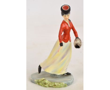 A Royal Worcester figure; "Emily", depicting a female ice skater, printed marks to base.