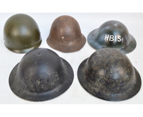 A military helmet with simulated painted mesh decoration inscribed "HBIS", and four other various helmets (5).