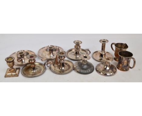 A group of six chambersticks including a pair, diameter 18cm, Elkington & Co, and three with rope twist decoration to rims, a