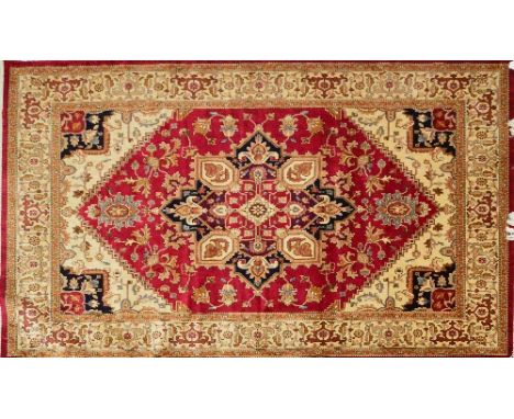 A red ground Heriz carpet, 280 x 200cm.