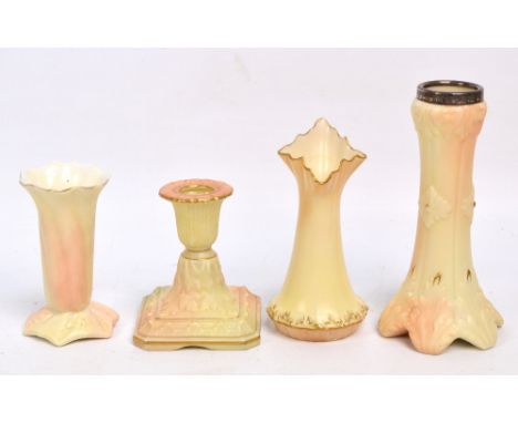 A small collection of Locke & Co Worcester blush ivory items with moulded decoration comprising a gilt heightened vase with E