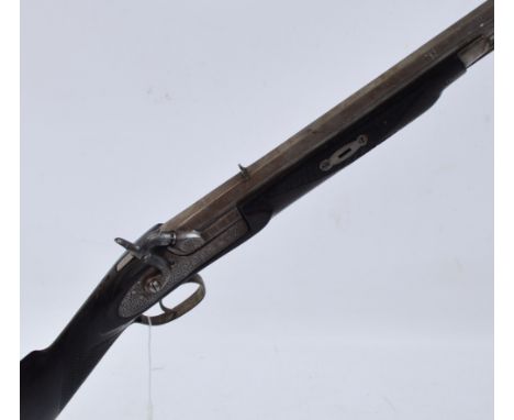 A 19th century muzzle loading percussion cap rifle, the large calibre octagonal heavy barrel with deep cut polygonal rifling,