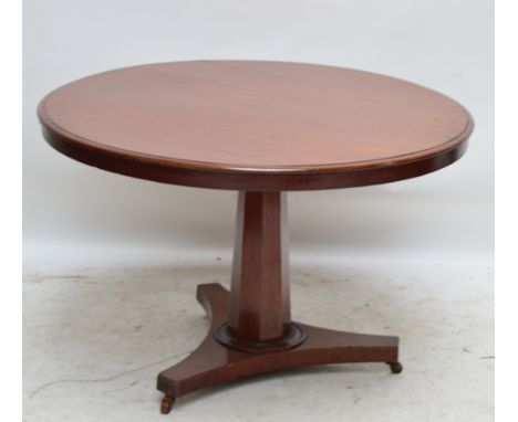 A Victorian circular mahogany tilt top small dining table with octagonal support and tripod plinth, height approx 70cm, diame