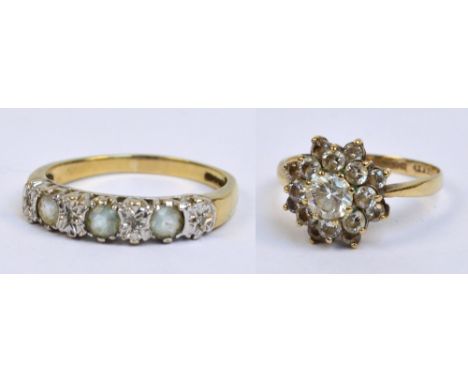 A 9ct yellow gold dress ring set with three light blue cut stones alternating with four tiny diamond chips, size R and a furt