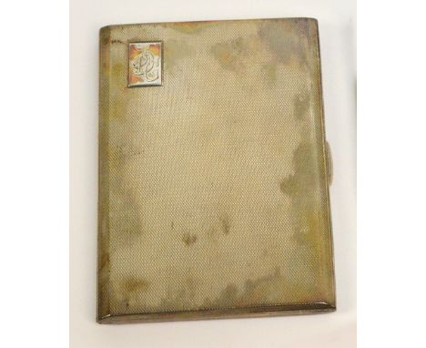 A George VI hallmarked silver cigarette case of rectangular form with overall engine turned decoration, with rectangular cart
