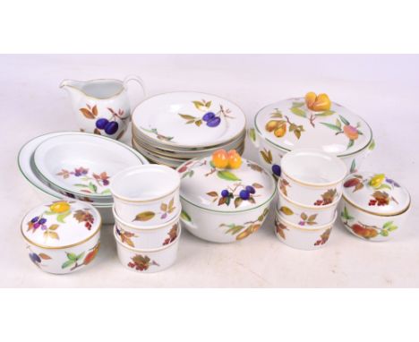 A quantity of Royal Worcester "Evesham" pattern oven to table ware, comprising one large, one medium and two small lidded tur