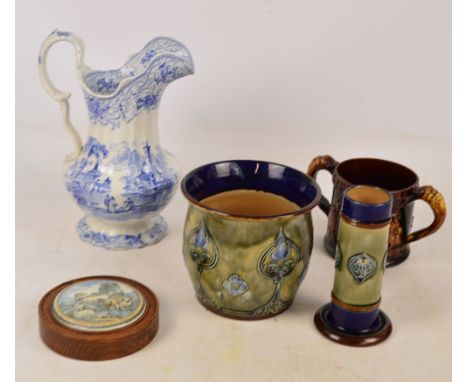 A Royal Doulton stoneware jardinière decorated with Art Nouveau stylised flowers, impressed marks, a similar spill vase, a 19