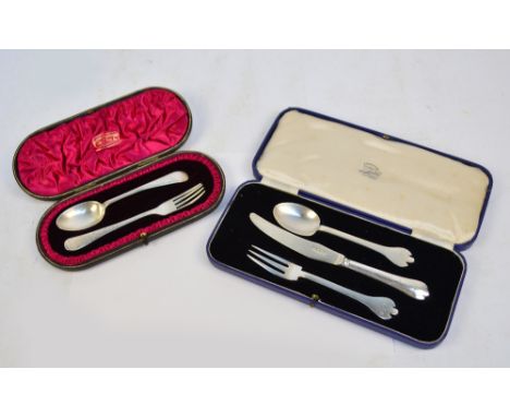 An Edward VII hallmarked silver Old English pattern christening set with bright cut decoration, comprising a fork and a spoon