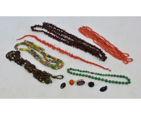 A quantity of costume jewellery including a four strand coral bead necklace, length 49cm, a graduated spiky coral necklace, l