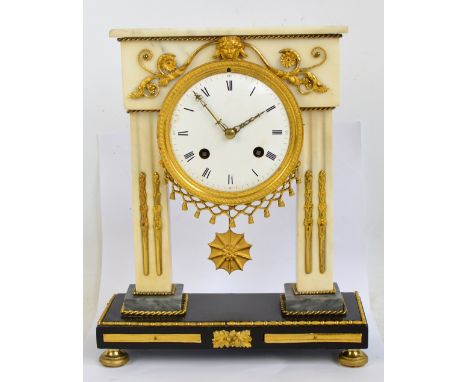 A mid 19th century French white marble and gilt bronze portico mantel clock, the circular enamel dial set with Roman numerals