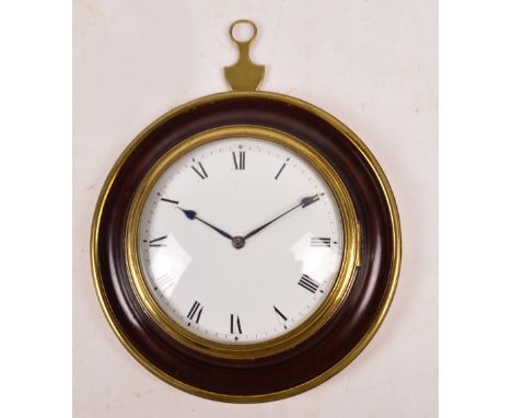 A late 18th century mahogany and brass bound sedan clock, the white enamel dial set with Roman numerals and with movement sig
