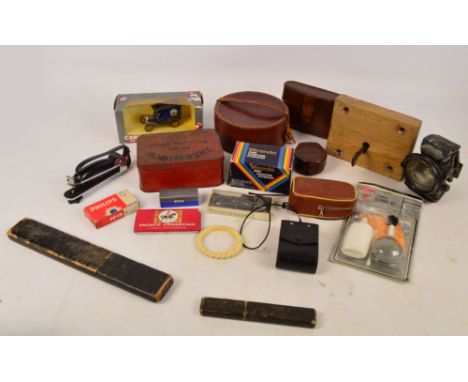 A quantity of collectors' items including a Voigtlander camera and camera accessories, a leather collar box and a leather stu