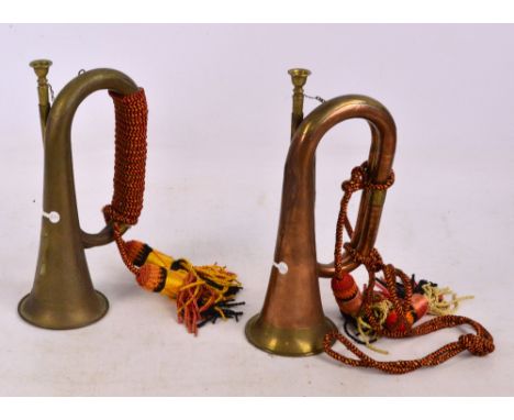 A brass bugle and a copper and brass bugle (2).
