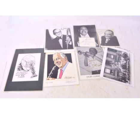 A signed black and white photograph of Count Basie, a signed black and white photograph of Benny Goodman, a signed and inscri
