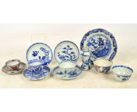 A group of Chinese porcelain painted in underglaze blue including a quatrilobed baluster vase, height 10cm, a pair of tea cup