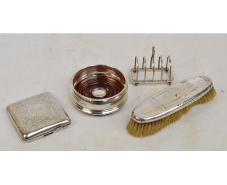 A George VI hallmarked silver four division toast rack of small dimensions, William Suckling Ltd, Birmingham 1941, an Edwardi