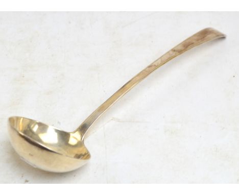 A white metal soup ladle with circular bowl, engraved "MH" to the terminal, marked with crowned P and with maker's mark "CSC"