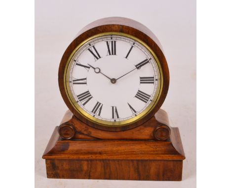 A small 19th century walnut cased drum timepiece, the white enamel dial set with Roman numerals and with eight day movement i