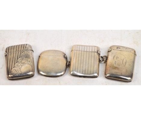 A Victorian hallmarked silver vesta case, partially engraved with foliate scrolls, centred with a circular vacant cartouche t