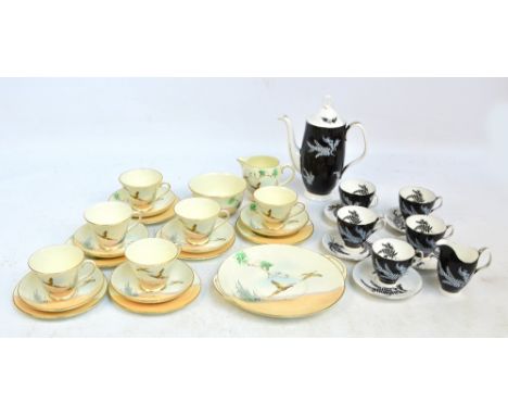 A Royal Doulton part tea set in "The Coppice" pattern comprising a jug and bowl, six cups and saucers, six tea plates and a s