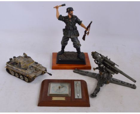 A modern boxed collectors' showcase 1/6th scale model, a model of a machine gun, a model of a tank and a barometer bearing pr