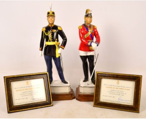A pair of Royal Worcester limited edition figures from the "Papal" series; "An Officer of the Palatine Guard" and "Colonel of