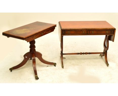 An early Victorian mahogany table with rectangular foldover top raised on central column with four outswept reeded legs, heig