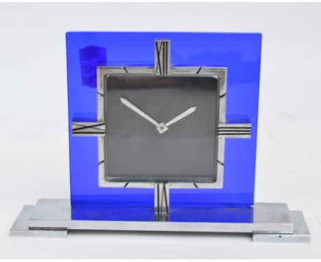 An Art Deco chrome and blue glass mantle timepiece, the square dial inscribed "Mappin", the stepped rectangular base inscribe