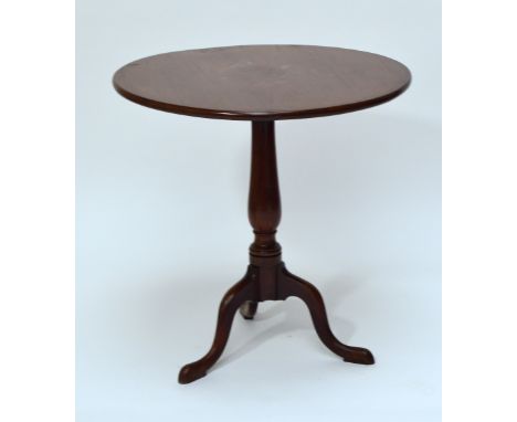 A George III circular occasional tripod table with central baluster turned column. CONDITION REPORT: This is mahogany. Diamet