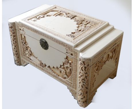 A 20th century ivory painted chest, the stepped and shaped top decorated with figures in a landscape and various carvings to 