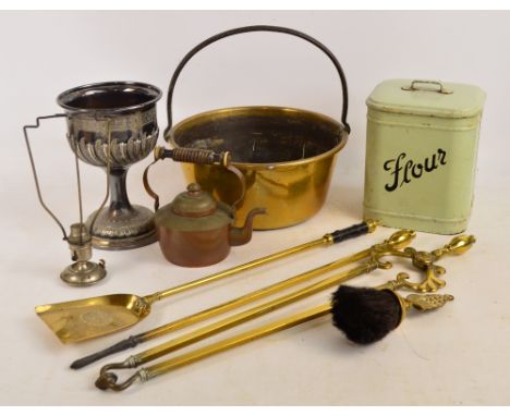A small group of metalware to include a matched four piece brass companion set, a brass jam pan, a copper kettle, a large ele