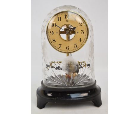 A 1930s Bulle mantel clock with very unusual floral etched and cut glass dome, Arabic numerals to the chapter ring and serial