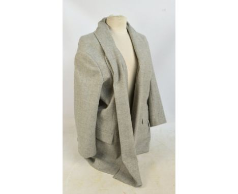 HERMES PARIS; a wool and cashmere jacket in cream and grey herringbone pattern with shawl collar, integral scarf neck and fou