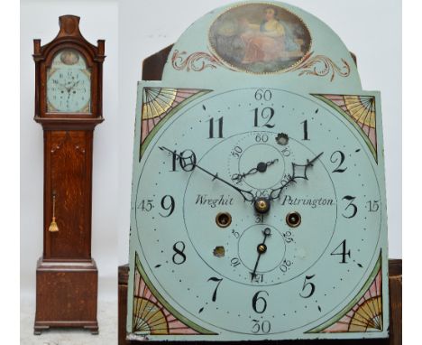 A George III oak cased eight day longcase clock, the hood with shaped pediment and circular enamel dial set with Arabic numer