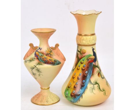 Two Locke & Co Worcester blush ivory vases with moulded decoration and both painted with peacocks; one shape 1043, with twin 