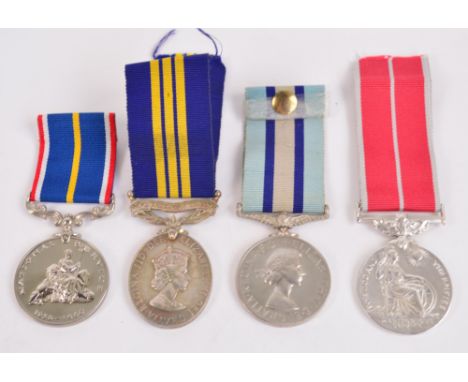 An Elizabeth II Efficiency Medal with Army Emergency Reserve bar awarded to 22150656 Cpl. E.K.McManus. R.Signals, a National 