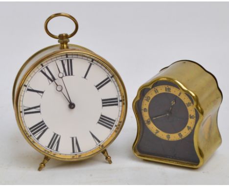 A circular drum type mantel clock with Roman numerals to the dial, height 11.5cm and a further decorative travelling clock wi