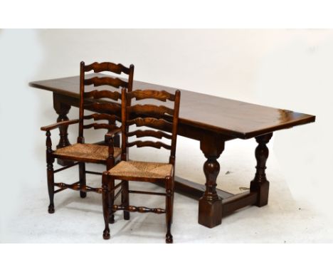 A Victorian oak refectory table on turned ring and baluster stretchered supports to block feet, 260 x 80cm, height 76cm, also