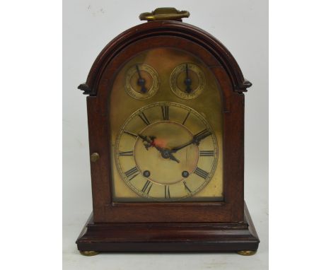 An early 20th century mahogany cased Winterhalder & Hofmeier eight day mantel clock with brass dial set with Roman numerals b